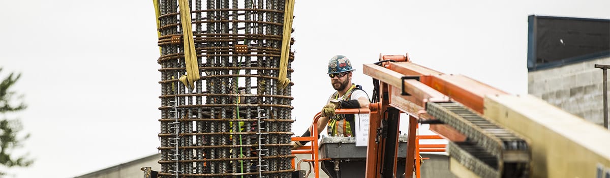 rebar worker in cherry picker